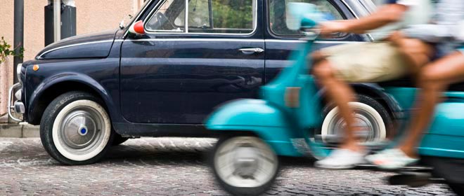 Riding a scooter in Italy